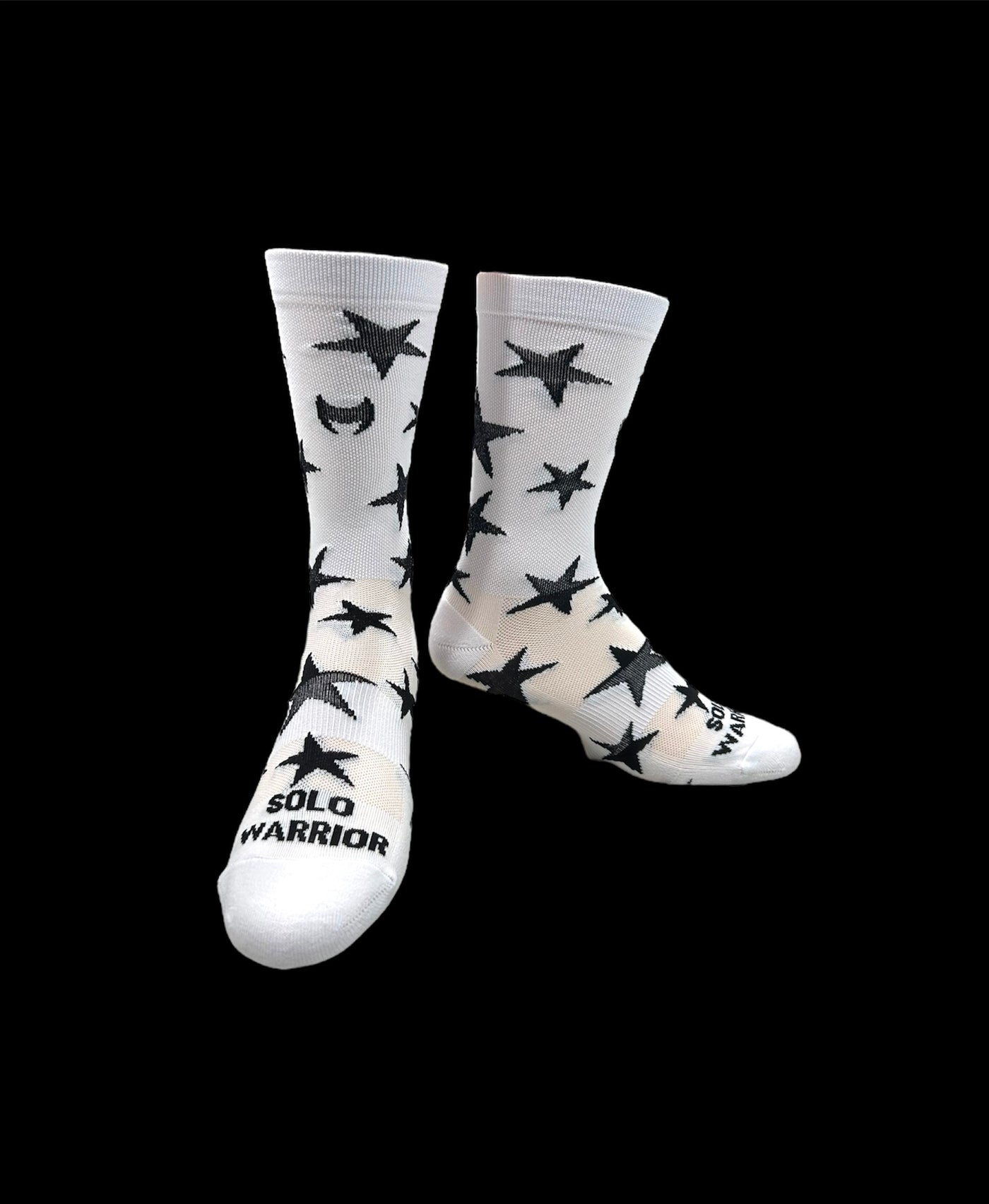“Star Power” is a 6" White and Black men and women's cycling and running sock with compression.