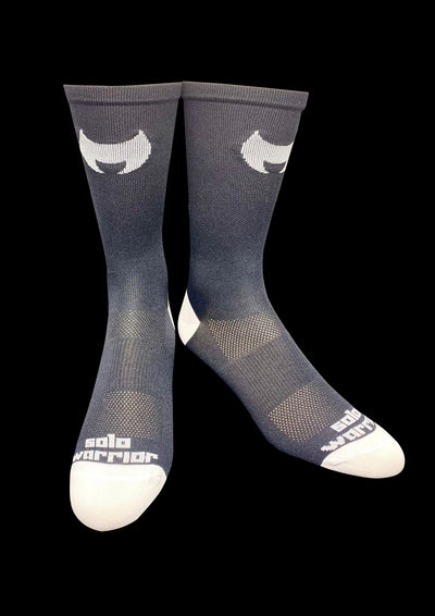 6” Men’s and Women’s black / white “Sunday Funday” cycling socks with compression.