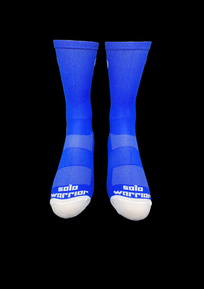 6” Men’s and Women’s solid ocean blue and white cycling sock with compression.