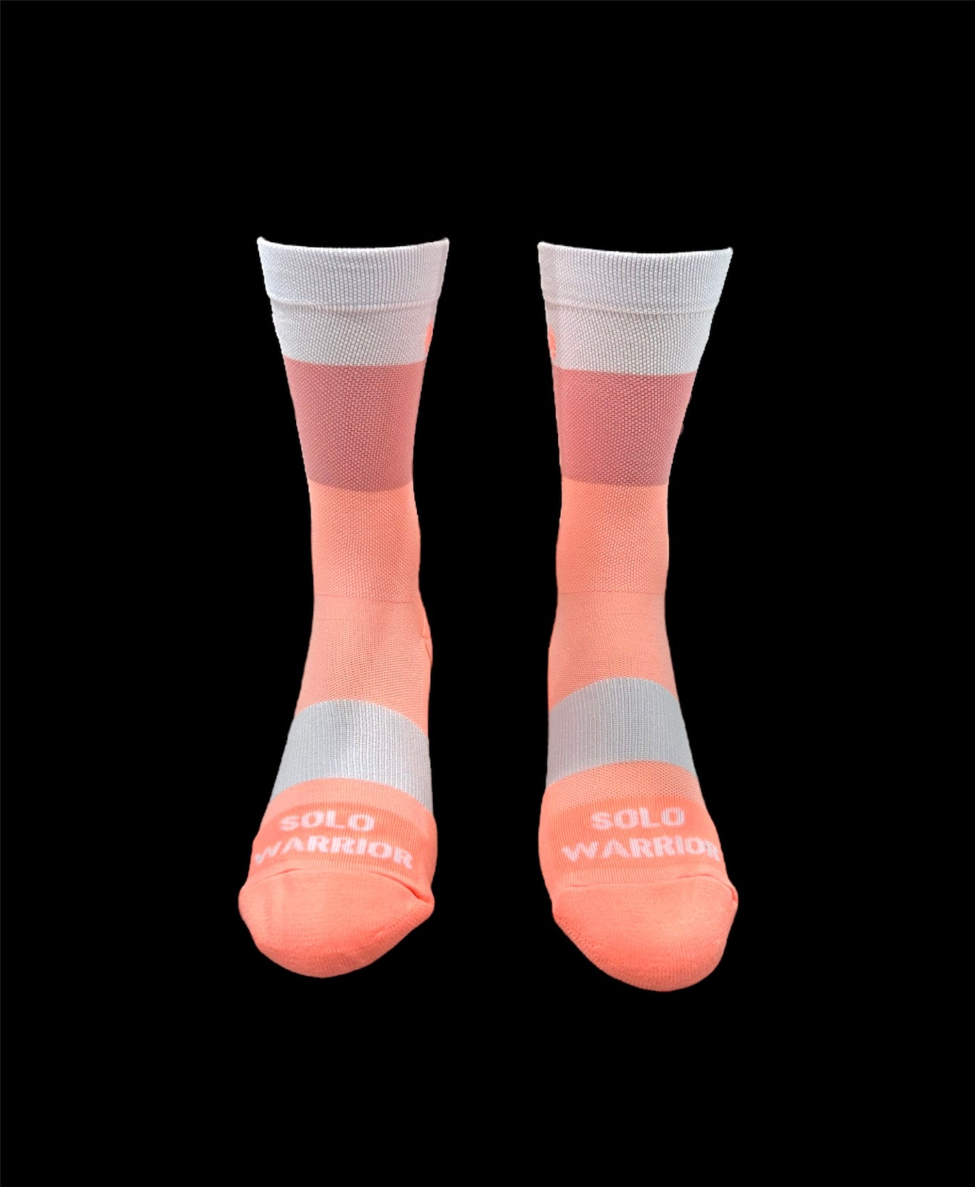 The ”Trio White, Pink and Salmon ” is a 6" men and women's cycling and running sock with compression.