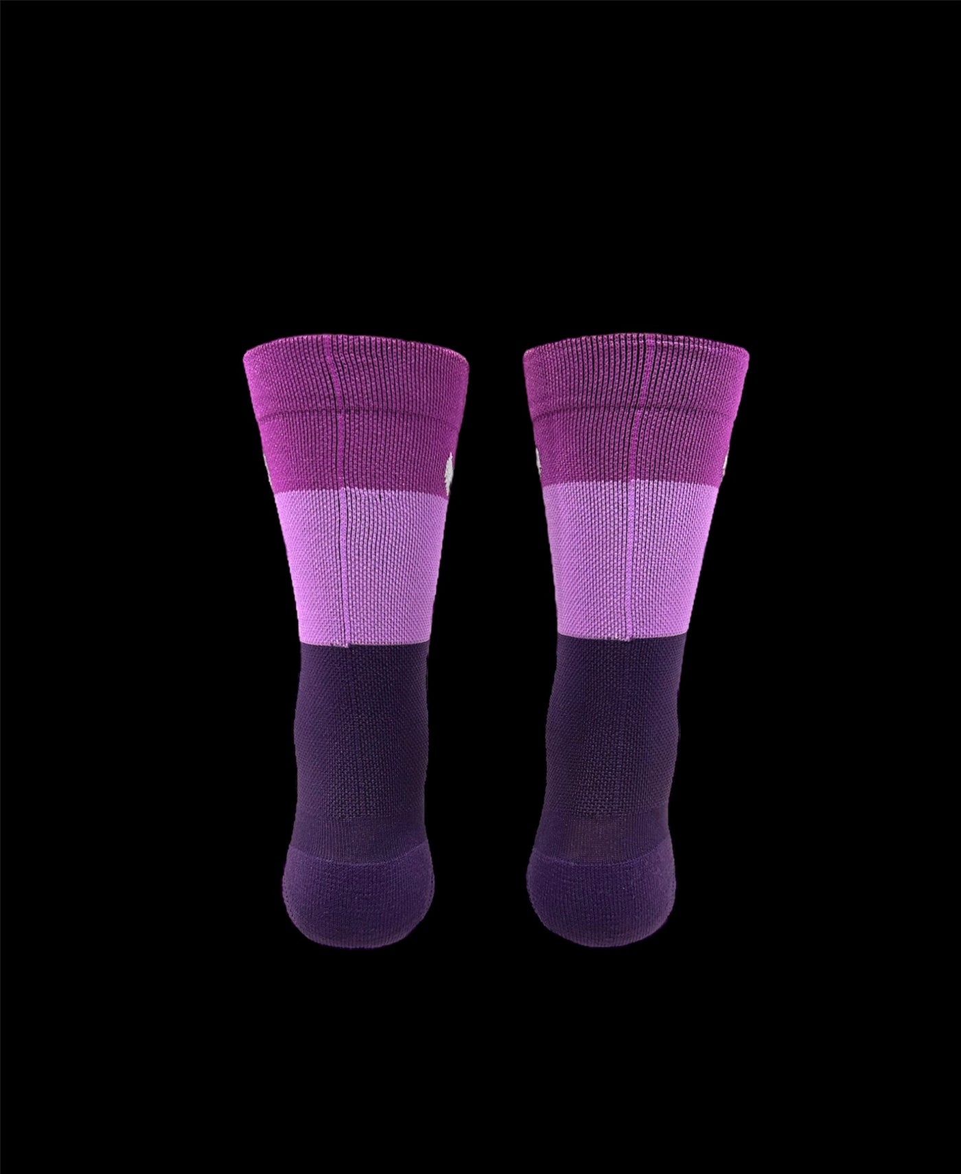 The ”Trio Purple” is a three shades of purple 6" men and women's cycling and running sock with compression.