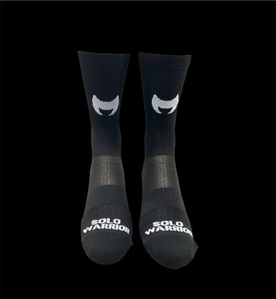 “YOLO” You Only Live Once, 6” black and white, men’s and women’s cycling sock with compression.