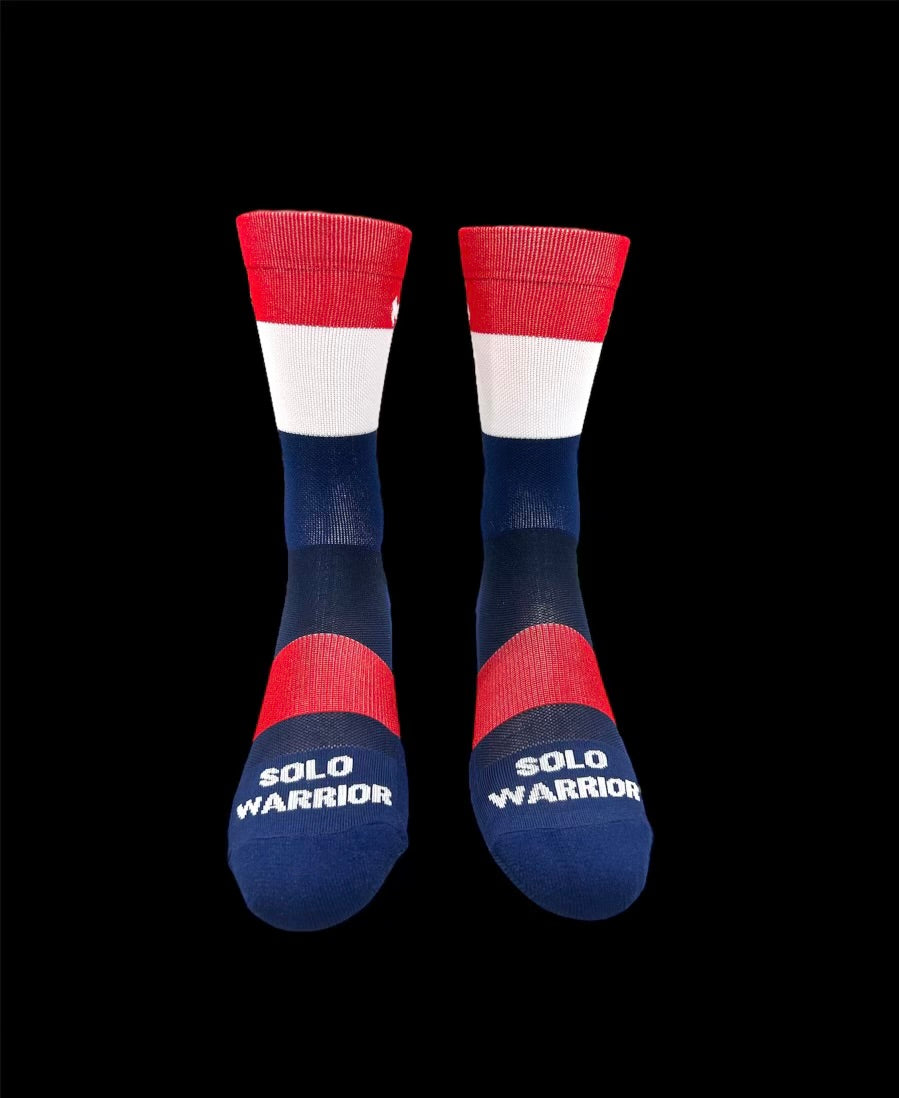 The ”Trio Red, White and Blue” is a 6" men and women's cycling and running sock with compression.