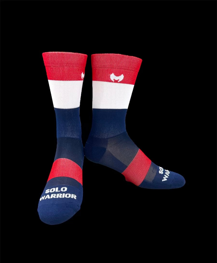 The ”Trio Red, White and Blue” is a 6" men and women's cycling and running sock with compression.