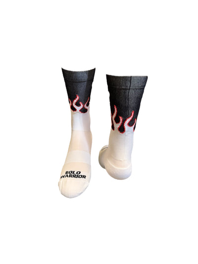 “The Fire” is a 6" White, Orange and black, men and women's cycling, running, and fitness sock with compression