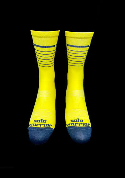 6” Men’s and Women’s yellow and black stripe  cycling socks with compression.