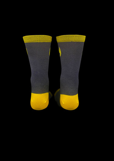 “ THE STRIP” our new  5” Cuff,  solid black with the yellow strip, cycling sock with more comfortable compression.