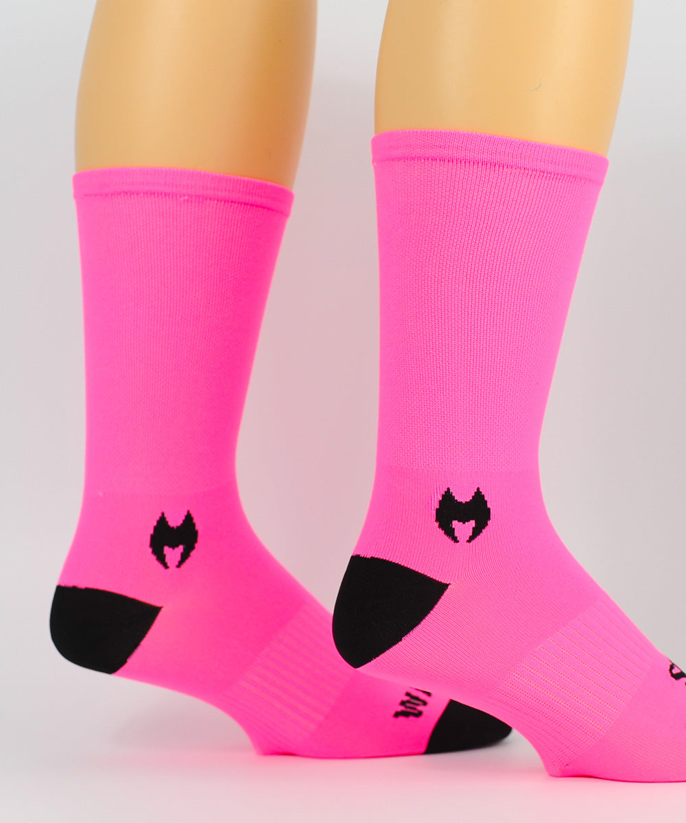 Solid Neon Pink 6 Men's & Women's cycling socks with compression.