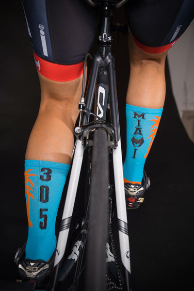 305 Miami blue 6" Men's and Women's cycling sock with compression.
